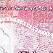 a close up of the ticker tape which runs across the bottom of the reverse of the note. The tape features binary which translates to Alan Turing's birthdate