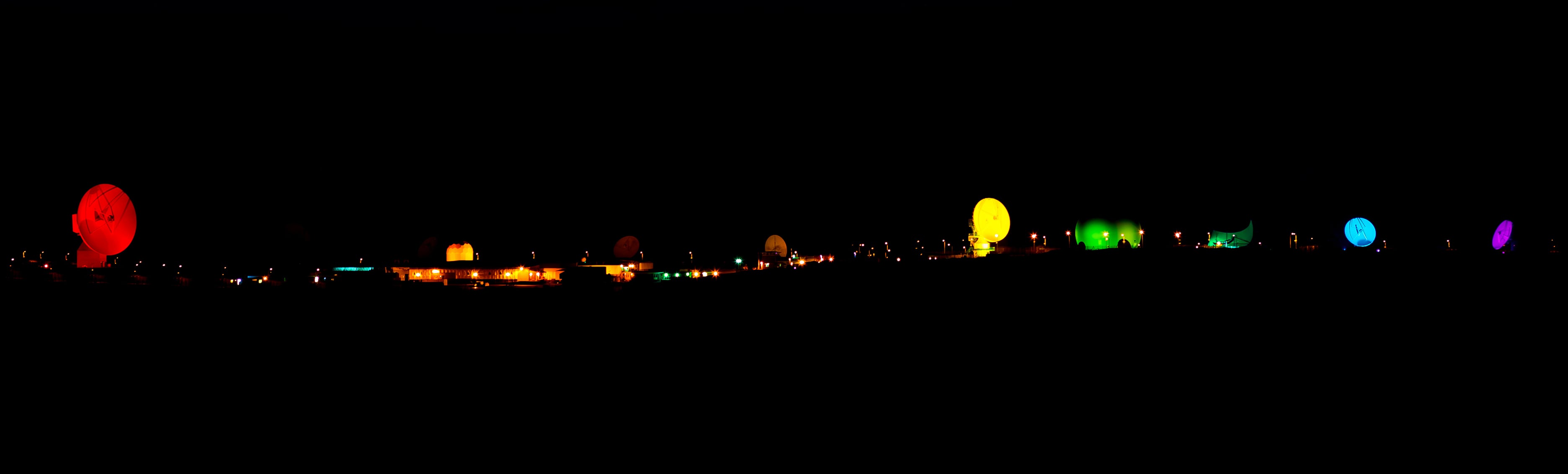 GCHQ Bude's aerials lit up in rainbow colours to celebrate IDAHOBiT Day 2016