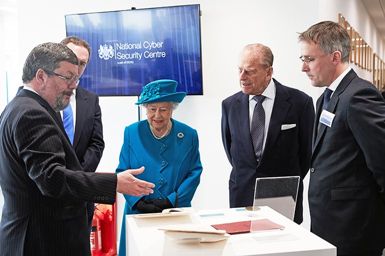 GCHQ Historian shows HM the Queen items from GCHQ's archives