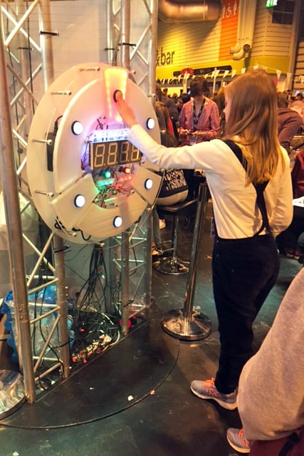 A student pressing the buttons in sequence.