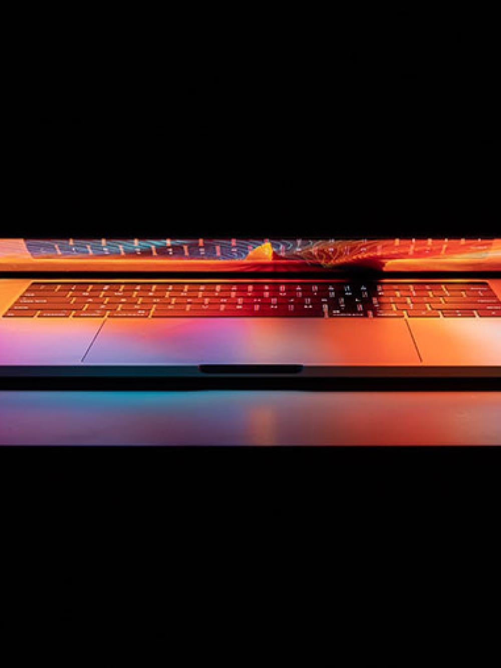 A half-closed laptop computer