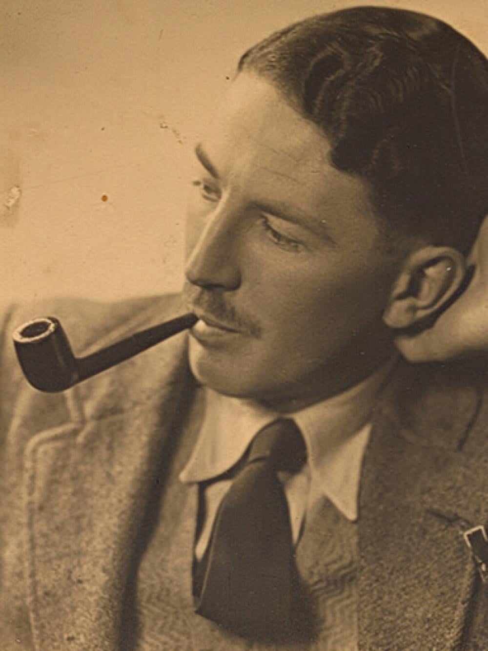 An image of Gordon Welchman smoking a pipe