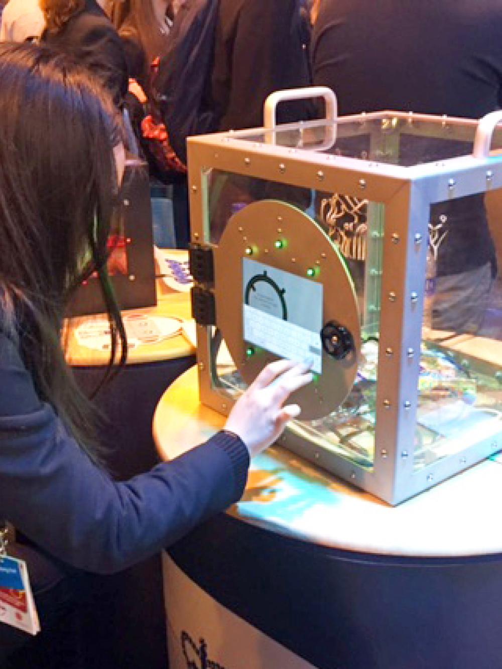 A girl playing GCHQ's Vault codebreaking game