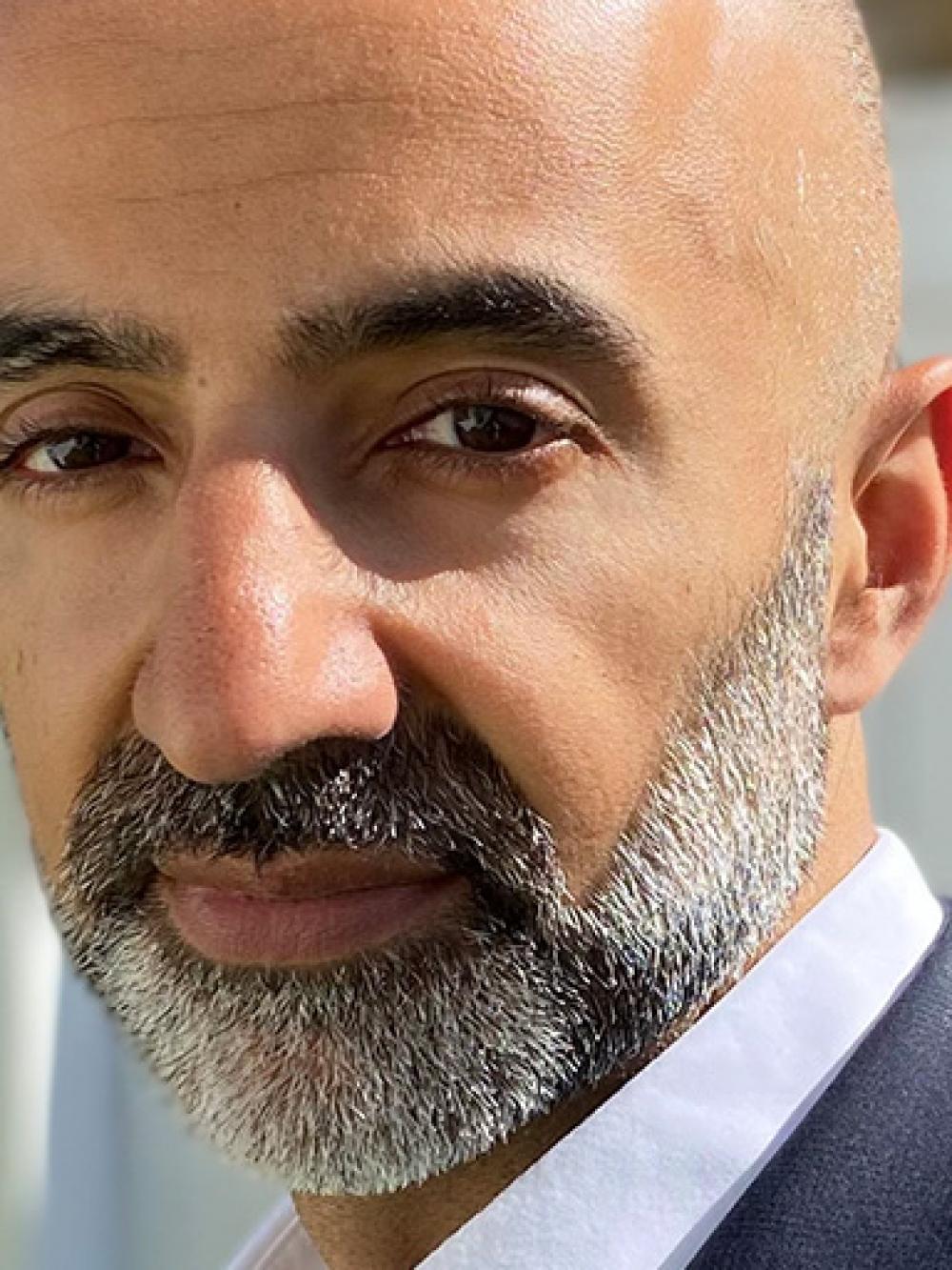 A headshot of GCHQ's Director of Legal Affairs, Shehzad Charania