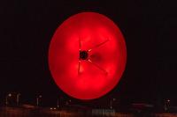 Satellite dish lit up at GCHQ Bude in November 2020