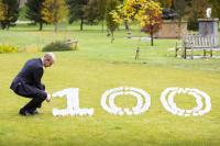 Director GCHQ placing marker at National Memorial Arboretum