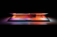 A half-closed laptop computer