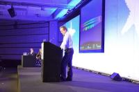GCHQ Director Robert Hannigan stood at plinth
