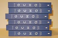 A pile of GCHQ Puzzle Books on their side