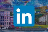 The LinkedIn logo over a faded version of GCHQ's launch puzzle