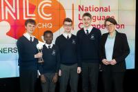 The winners of the NLC pose with the trophy presented by Director GCHQ
