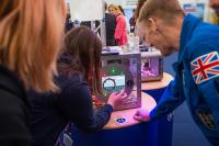 British astronaut, Major Tim Peake, visited the GCHQ stand and watched some young adults take on our Vault game
