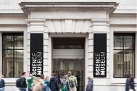 London Science Museum entrance with a queue of people entering