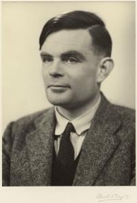 Sepia coloured bromide print portrait of Alan Turing taken on 29 March 1951