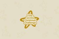 The GCHQ Christmas Challenge logo in gold text, on a light opaque background with hand-drawn stats